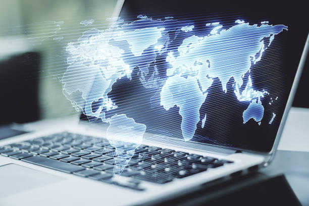 istock Multi exposure of abstract creative digital world map on laptop background, research and analytics concept 1283720948