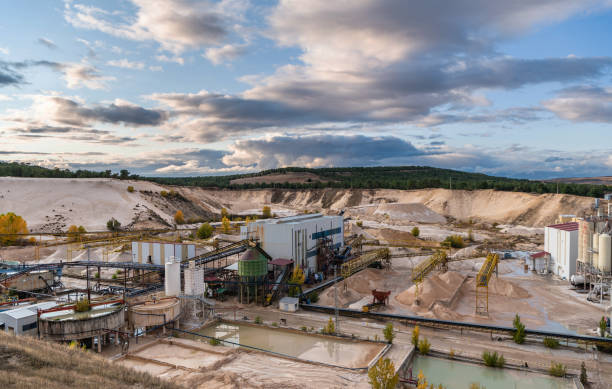 istock Industrial landscape of a silica sand open pit mine 1283721464