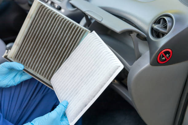 istock Dirty and clean cabin pollen air filter for a car 1283721490