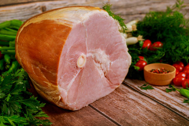 istock Ham with fresh dill, chive and tomato on wooden table.. 1283722695
