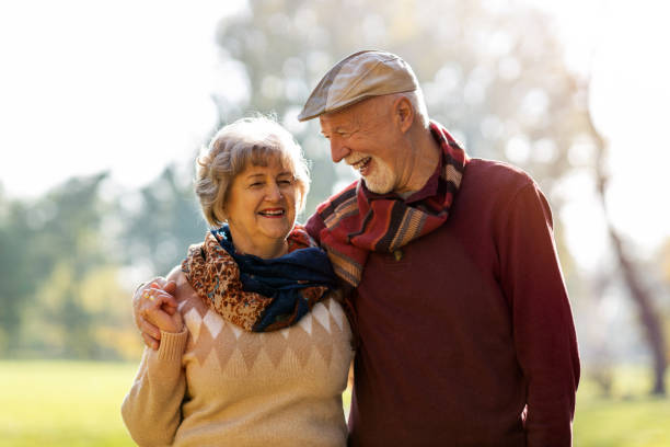 istock Happy senior couple enjoying a day outdoors in autumn 1283723740