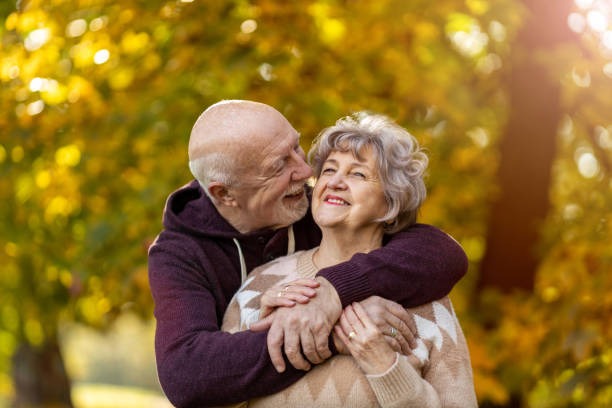 istock Happy senior couple enjoying a day outdoors in autumn 1283724452