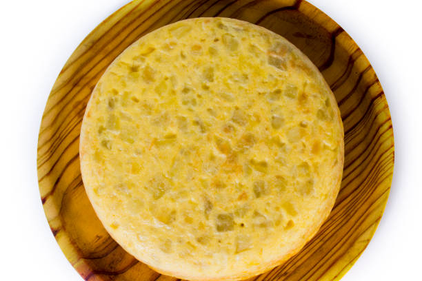 istock Spanish omelette on a wooden tray on white background 1283724463