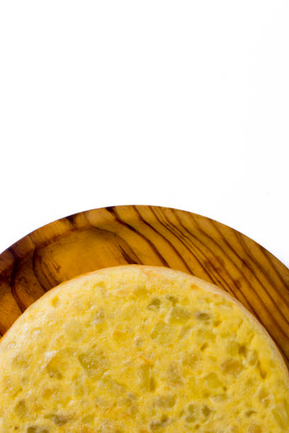 istock Spanish omelette on a wooden tray on white background 1283724532