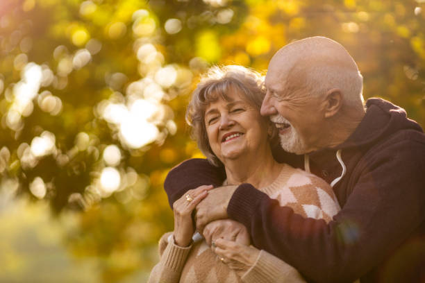 istock Happy senior couple enjoying a day outdoors in autumn 1283724559