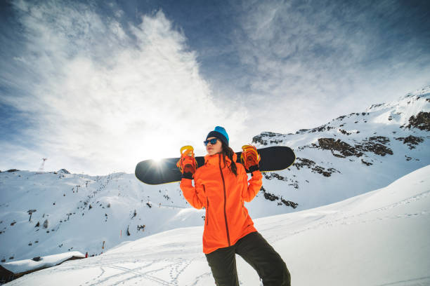 winter holidays in ski resort - skiing winter women snow imagens e fotografias de stock
