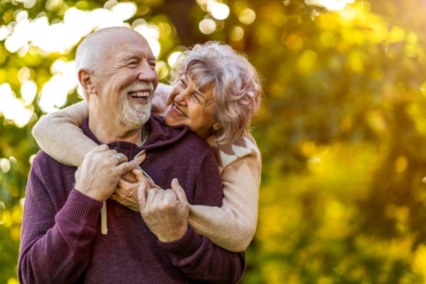 istock Happy senior couple enjoying a day outdoors in autumn 1283725307