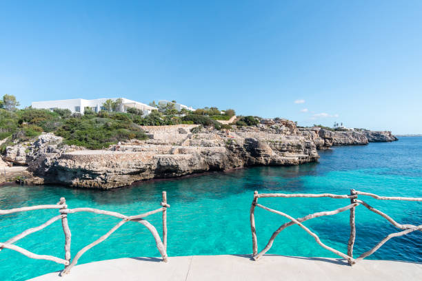 Turquoise waters of Cala en Brut, beach of Minorca, Balearic Islands in Spain Turquoise waters of Cala en Brut, beach of Minorca, Balearic Islands in Spain minorca photos stock pictures, royalty-free photos & images