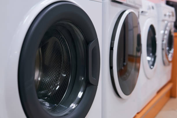 istock range of washing machines sold in a hardware store 1283725922