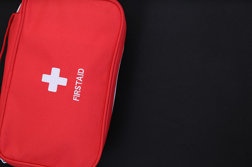 first aid kit black background