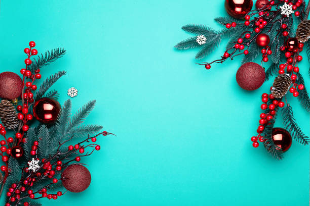 istock Christmas ornament on the red background. Top view with copy space for your text. 1283728415