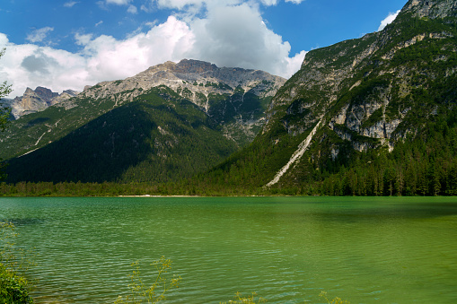Mountain landscape at summer along the road of Landro valley, Dolomites, Bolzano province, Trentino Alto Adige, Italy, from Misurina to Dobbiaco. The lake