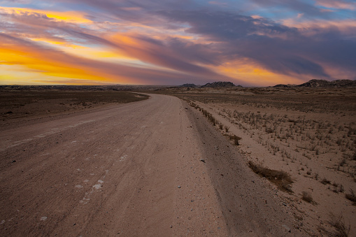 landcape with awesome sunset sky over Namib Desert in Namibia, southern Africa