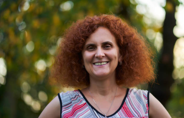 istock Curly redhead in the countryside 1283729218