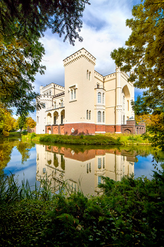 Lednice Chateau with beautiful gardens and parks. Lednice-Valtice Landscape, South Moravian region. UNESCO World Heritage Site.