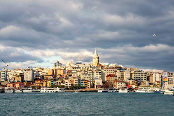 istanbul, Turkey - Jan 25, 2018: View of the Galata bridge and the Galata Tower. The bridge spans the Golden Horn