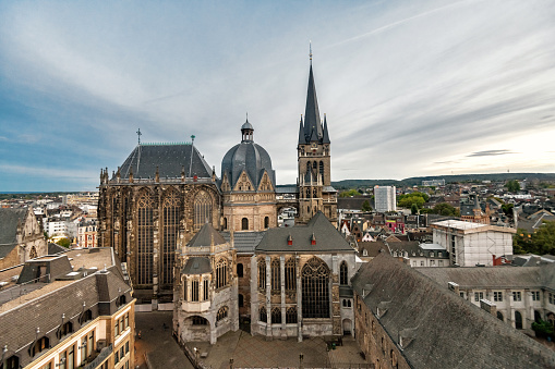 high angle view on cityscape  of Aachen with cathedral at sunset hour
