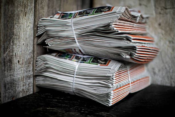 Pile of newspapers for delivery stock photo