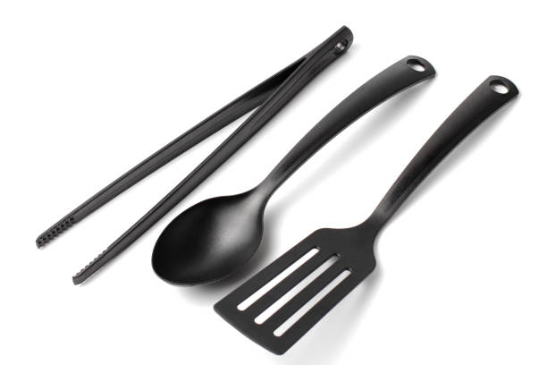 istock Home cooking utensil, spatula, spoon, cooking tweezers, white background, close-up, isolate. 1283731853