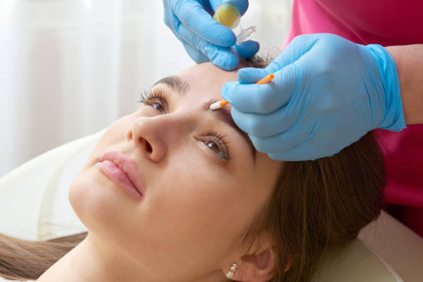 istock Professional eyebrow correction in beauty salon 1283732515