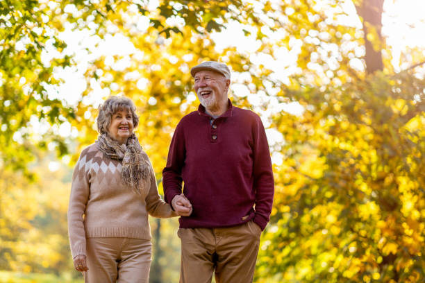 istock Happy senior couple enjoying a day outdoors in autumn 1283733989