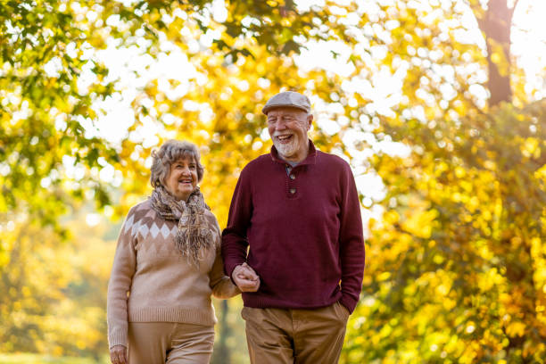 istock Happy senior couple enjoying a day outdoors in autumn 1283734361