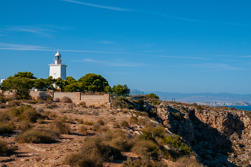 The lighthouse of Cabo de Santa Pola is located in Cabo de Santa Pola, Alicante, from where it dominates both the bay of Alicante and the orchard of Elche and the island of Tabarca