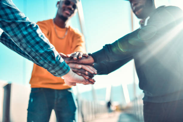 istock Teamwork And Togetherness Expressed By Multiethnic Male Friends 1283735755