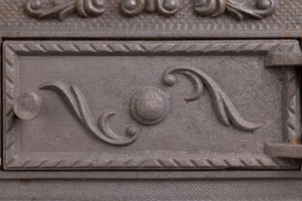 istock Cast iron door for furnaces. Fragment. 1283743408