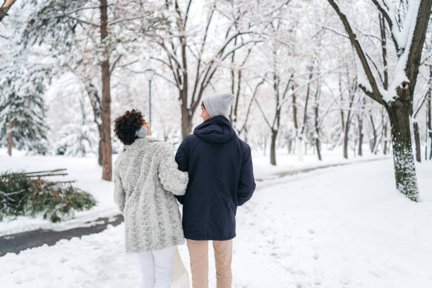 istock Young couple in the snow 1283744679