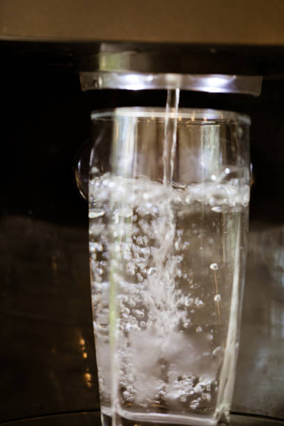 istock Water pouring into a glass 1283745563