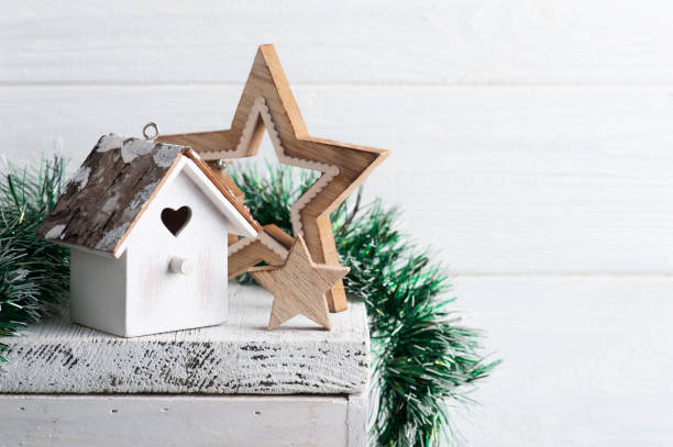 istock Christmas interior decoration whit birdhouse 1283746042