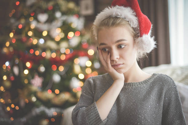 young woman in christmas interior
