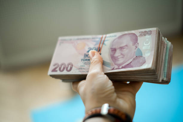 istock Stack of Turkish Money in hand 1283753115