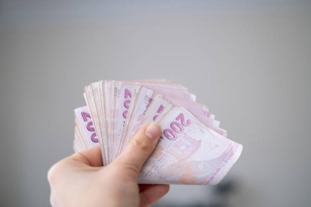 istock Stack of Turkish Money in hand 1283753191