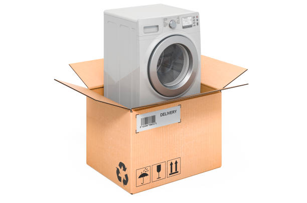 istock Washing machine inside cardboard box, delivery concept. 3D rendering isolated on white background 1283753464