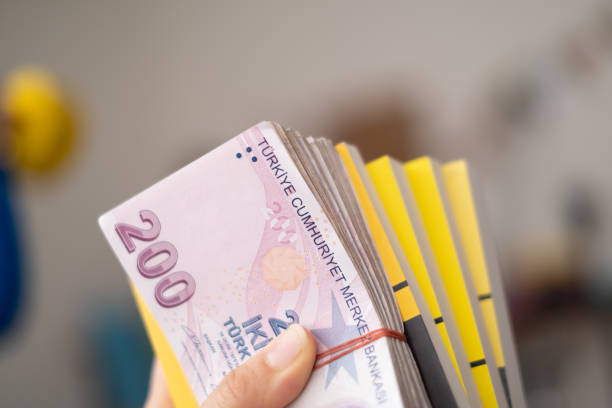 istock Stack of Turkish Money on books 1283753565