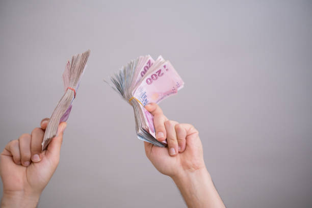 istock Hands up in the air with Turkish Money 1283755907