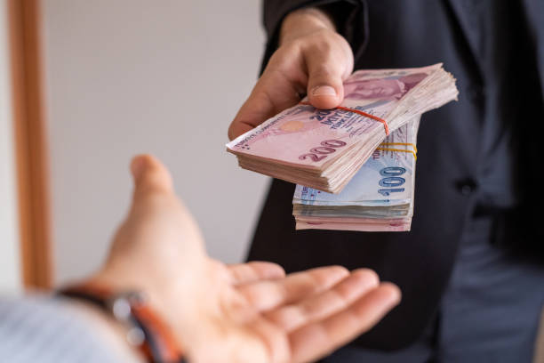 istock Giving Cash Money 1283756168