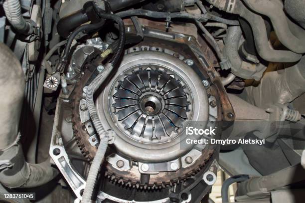 View Of The Clutch Basket Mounted On The Car Stock Photo - Download Image Now - Vehicle Clutch, Car, Repairing