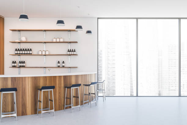 istock Modern white bar interior with wooden counter and window 1283763997