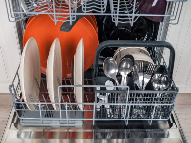 istock dishwasher close-up with washed dishes, easy to use and save water, eco-friendly, built-in kitchen dish washing 1283765166