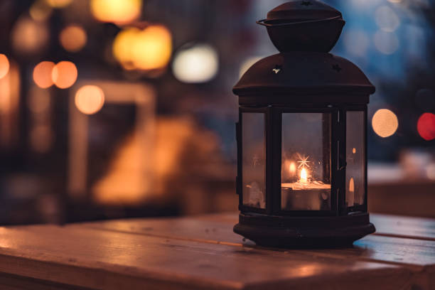 istock table lantern evening magic atmosphere concept picture with dark phantom blue outdoor background view with street lamps unfocused illumination 1283765234