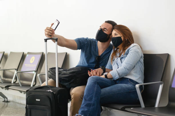istock Young couple at the Airport 1283766326