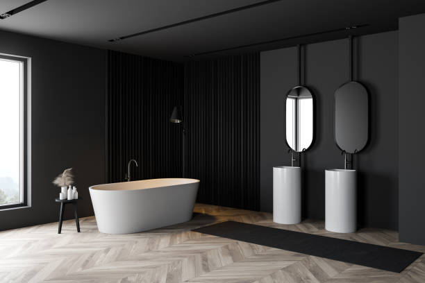 istock Dark gray bathroom corner, tub and sink 1283766425