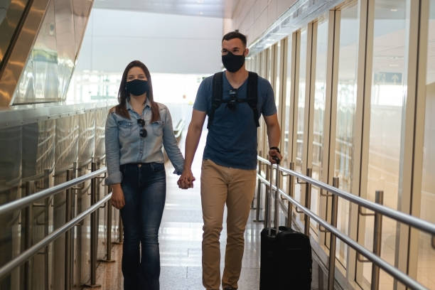 istock Young couple at the Airport 1283767162