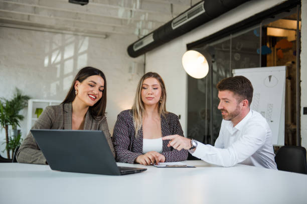 istock Group of business people at the office 1283767270