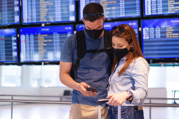 istock Young couple at the Airport 1283767300