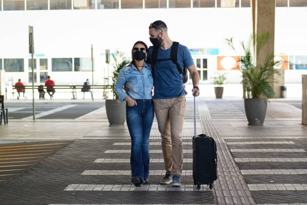 istock Young couple at the Airport 1283768201