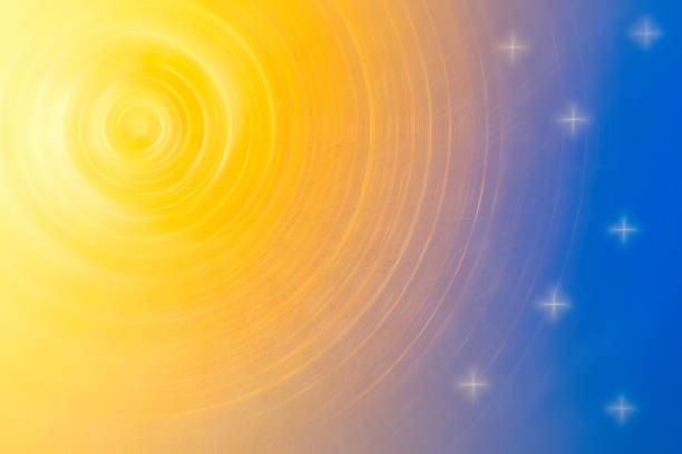 Abstract shining background and texture. Glowing light lines of bright colors against a dark background. Graphic digital image